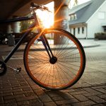 A commuter bicycle in front of a sunrise
